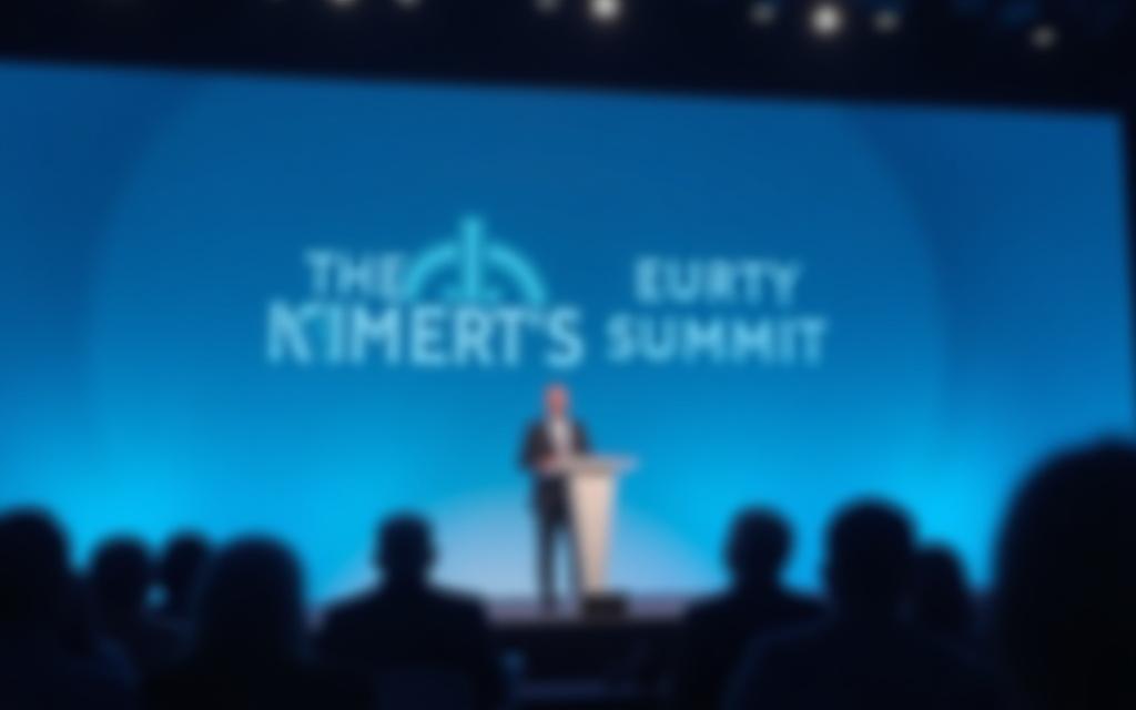 Speaker on stage at climate summit
